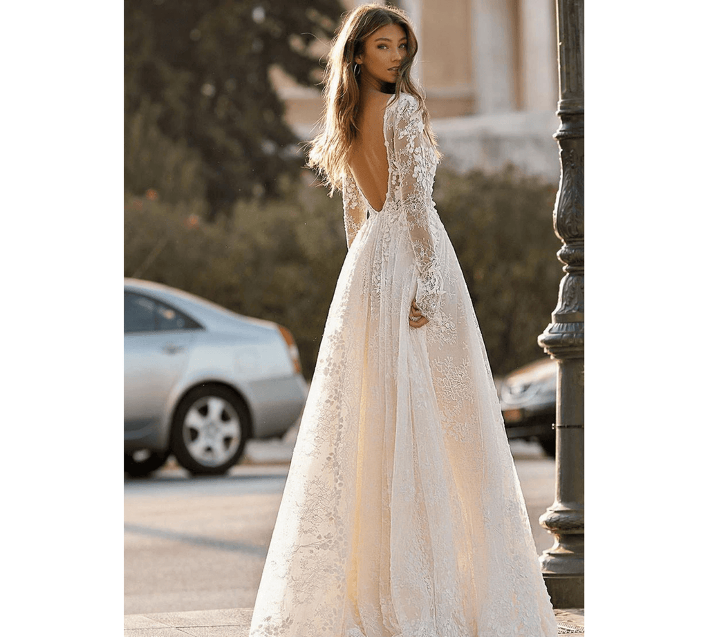 Side angle of boho maxi wedding dress showing natural waistline and full-length skirt