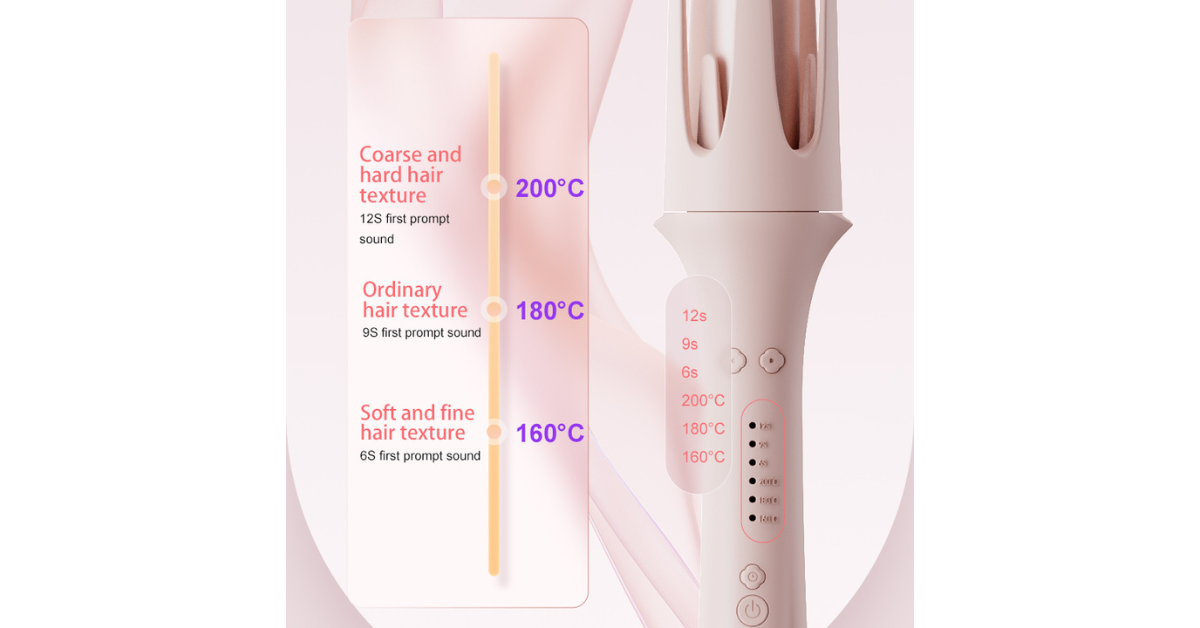 Pink automatic hair curler on table