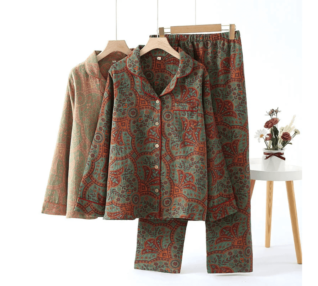 Button-down pajama shirt and elastic waistband pants shown hanging side by side

