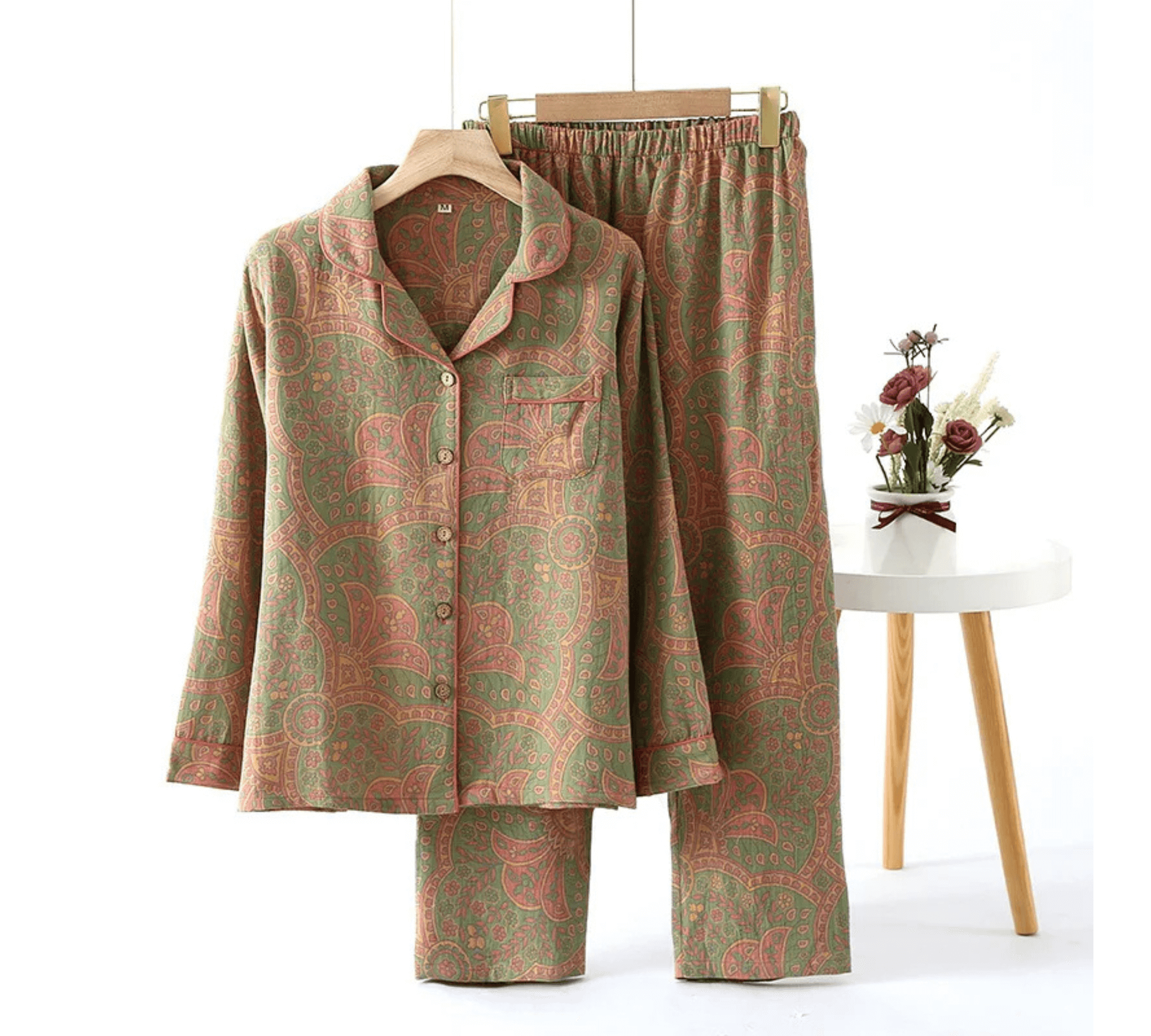 Traditional style women's pajamas featuring turn-down collar and soft fabric on hanger