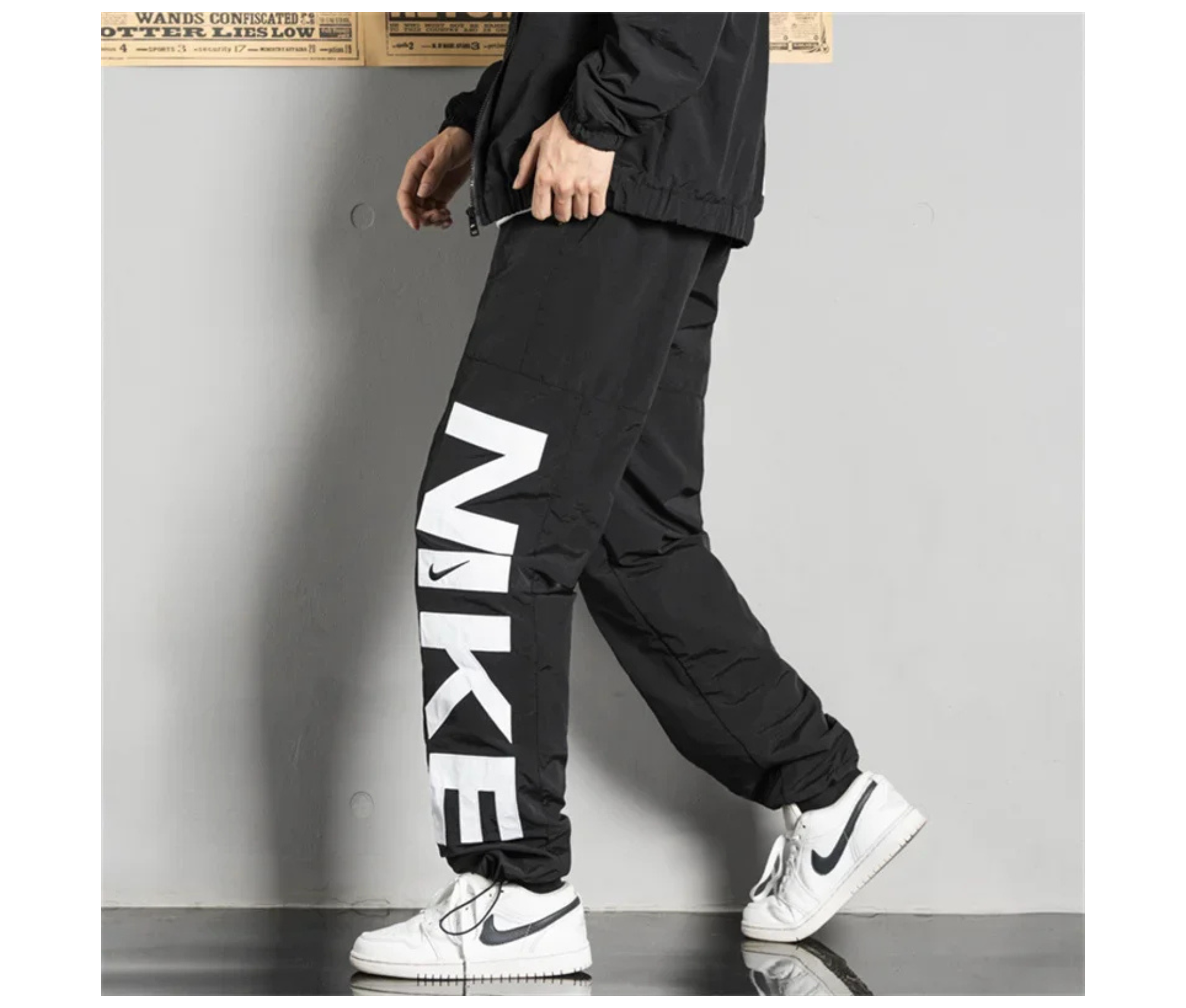 Product photo showing stylish black nike sweatpants for men