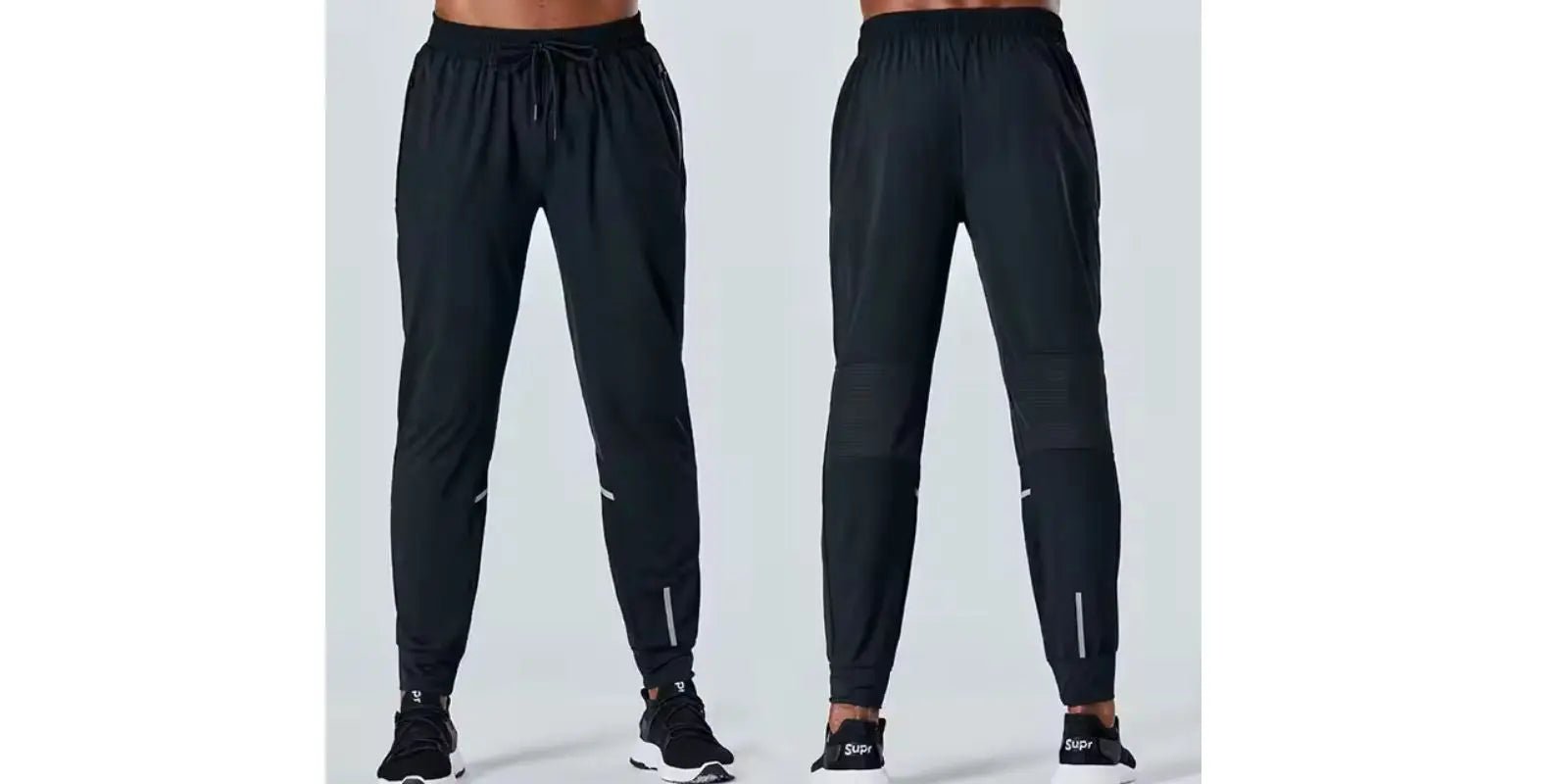 Omnibaya men's navy blue joggers shown from front and back with elastic waistband and tapered legs